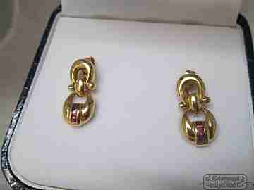 Earrings. 18K yellow gold and rubies. Case. 1970's. Woman