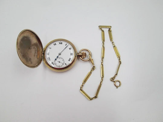 Elgin hunter-case pocket watch with chain. Gold plated. Stem-wind. Porcelain dial. 1930's