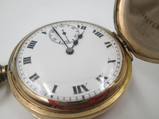 Elgin hunter-case pocket watch with chain. Gold plated. Stem-wind. Porcelain dial. 1930's