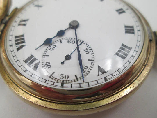 Elgin hunter-case pocket watch with chain. Gold plated. Stem-wind. Porcelain dial. 1930's