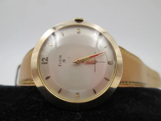 Elgin. 10 karat gold filled. Manual wind. Small second hand. Strap. 1950's. USA