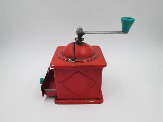Elma coffee grinder. Red lacquer metal and green plastic details. Spain. 1950's