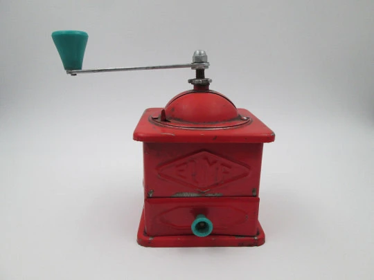 Elma coffee grinder. Red lacquer metal and green plastic details. Spain. 1950's