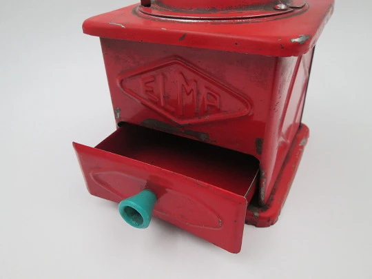 Elma coffee grinder. Red lacquer metal and green plastic details. Spain. 1950's