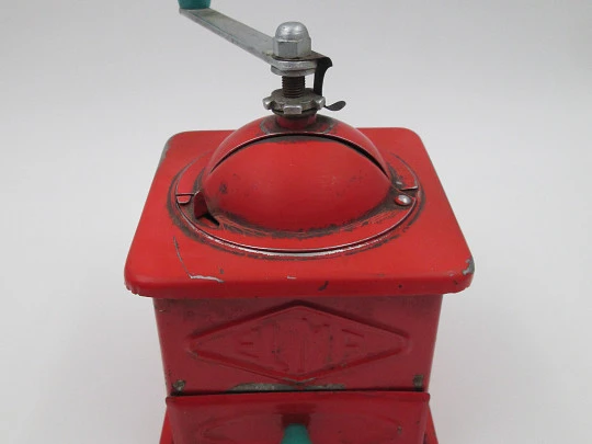 Elma coffee grinder. Red lacquer metal and green plastic details. Spain. 1950's