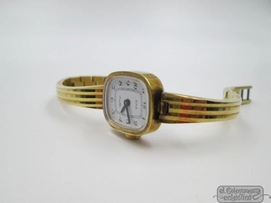 Ema. Steel & gold plated. Manual wind. Woman. Swiss. Bracelet