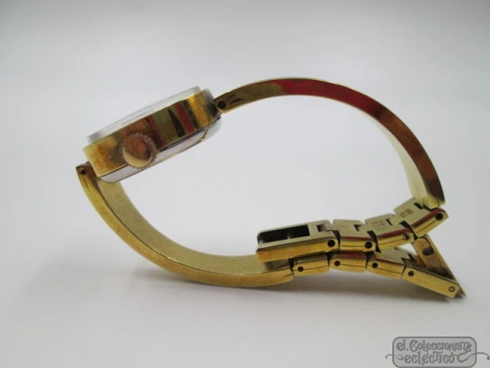 Ema. Steel & gold plated. Manual wind. Woman. Swiss. Bracelet