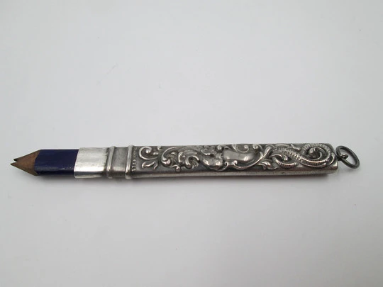 Embossed sterling silver pencil. Floral & vegetable motifs. England. 1900's