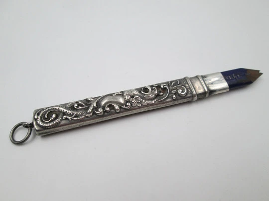 Embossed sterling silver pencil. Floral & vegetable motifs. England. 1900's