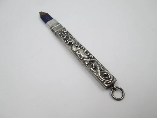 Embossed sterling silver pencil. Floral & vegetable motifs. England. 1900's