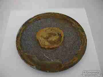 Enamel on copper. Circular shape. Gold crane bird. Blue background