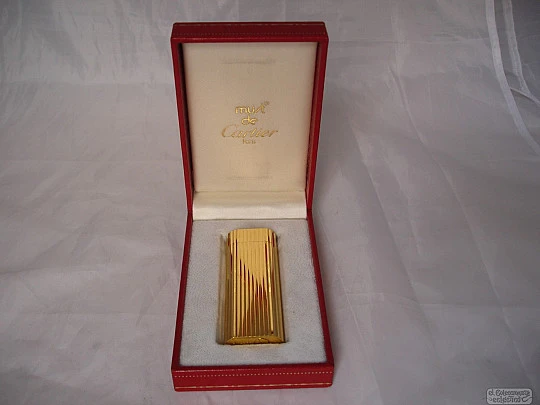 Encendedor Cartier Le Must. Laminado en oro. Caja original