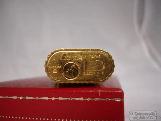 Encendedor Cartier Le Must. Laminado en oro. Caja original