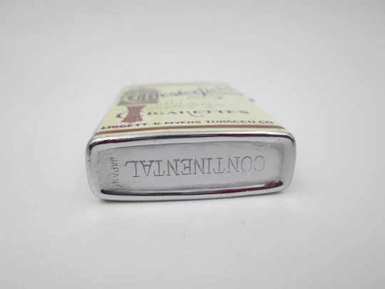 Encendedor Continental. Cigarrillos Chesterfield. Metal cromado. Caja. Japón. 1980