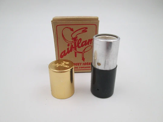 Encendedor de bolsillo a metanol Airflam. Estuche e instrucciones. Alemania. 1952
