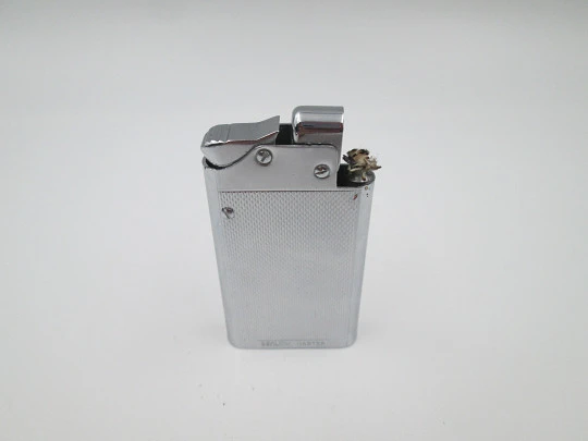 Encendedor de bolsillo automático a gasolina Benlow Master. Metal plateado. Caja. 1950 Encendedor de bolsillo automático a gasolina Benlow Master. Metal plateado. Caja. 1950