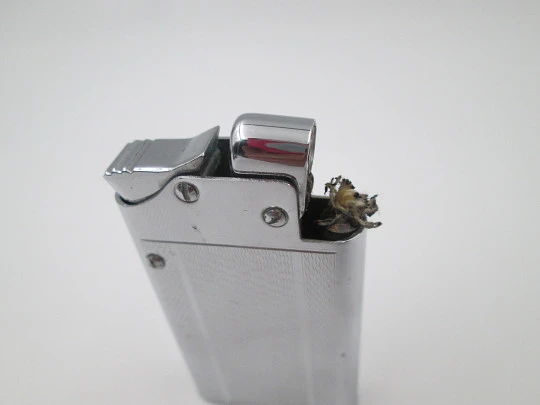 Encendedor de bolsillo automático a gasolina Benlow Master. Metal plateado. Caja. 1950