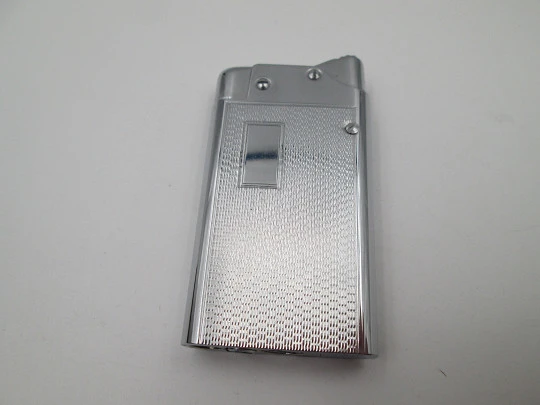 Encendedor de bolsillo automático a gasolina Benlow Master. Metal plateado. Caja. 1950 Encendedor de bolsillo automático a gasolina Benlow Master. Metal plateado. Caja. 1950