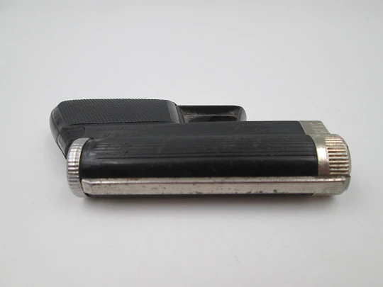 Encendedor de bolsillo Imco Gunlite G 66-R. Plástico negro y metal. Pistola a gas. 1970