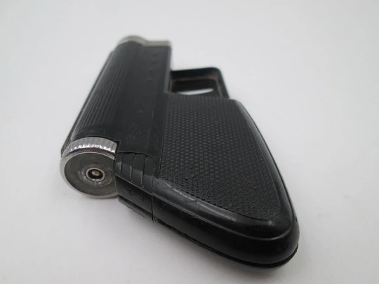 Encendedor de bolsillo Imco Gunlite G 66-R. Plástico negro y metal. Pistola a gas. 1970