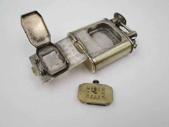 Encendedor de gasolina Corona con reloj mecánico Atlantic. Metal dorado. 1940 Encendedor de gasolina Corona con reloj mecánico Atlantic. Metal dorado. 1940