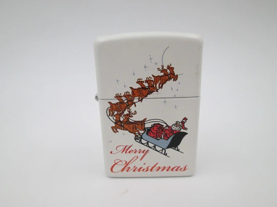 Encendedor gasolina Zippo Merry Christmas. Metal cromado y esmalte colores. EEUU. 2009