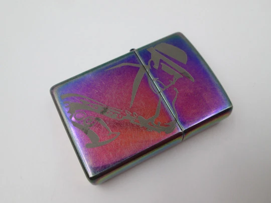 Encendedor gasolina Zippo Rainbow Jazz. Metal cromado multicolor. EEUU. 2005