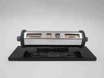 English office desk perpetual calendar. Silver plated metal & black resin stand. 1970's