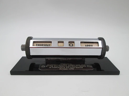 English office desk perpetual calendar. Silver plated metal & black resin stand. 1970's