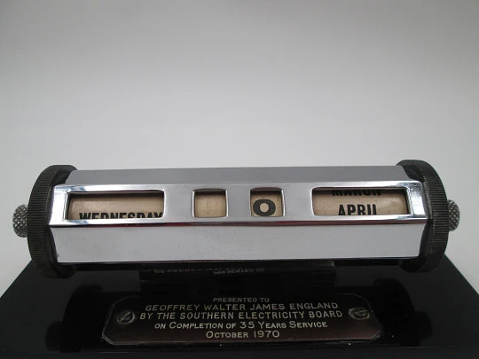 English office desk perpetual calendar. Silver plated metal & black resin stand. 1970's