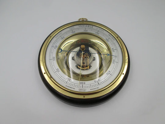 Enosa wall circular aneroid barometer. Wood, iron and brass. Metallic dial. Spain. 1960's