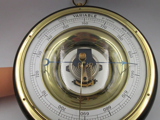 Enosa wall circular aneroid barometer. Wood, iron and brass. Metallic dial. Spain. 1960's