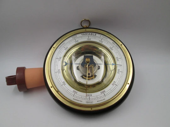 Enosa wall circular aneroid barometer. Wood, iron and brass. Metallic dial. Spain. 1960's