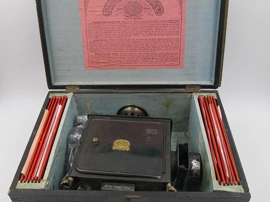 Ernst Plank Magic Lantern. Germany. Twelve slides. Original wood box. 1900