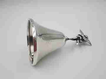 Esquila / campanilla con motivo de querubín alado. Plata de ley 925. España. 1990