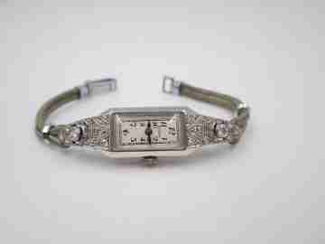 Eszeha Chopard ladie's art deco wristwatch. 18k gold & diamonds. 1930's