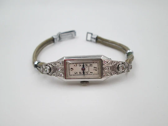 Eszeha Chopard ladie's art deco wristwatch. 18k gold & diamonds. 1930's