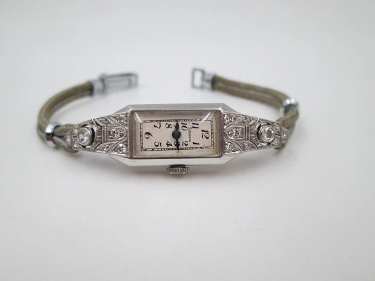 Eszeha Chopard ladie's art deco wristwatch. 18k gold & diamonds. 1930's