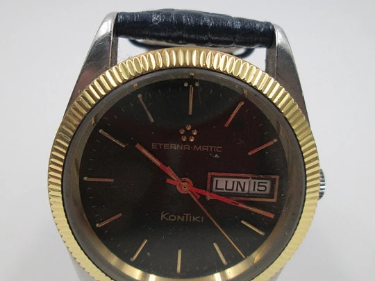 Eterna Matic Kontiki. Acero / chapado oro. Automático. Día y fecha. Dial negro