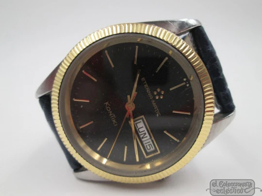 Eterna Matic Kontiki. Acero / chapado oro. Automático. Día y fecha. Dial negro