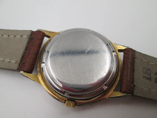 Eterna Matic. Acero y chapado oro. Automático. Esfera champagne. 1960