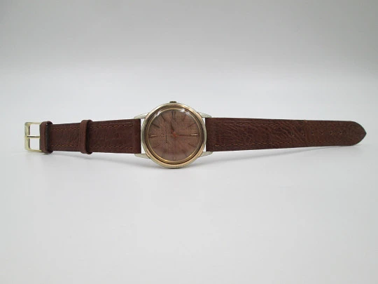 Eterna Matic. Acero y chapado oro. Automático. Esfera champagne. 1960