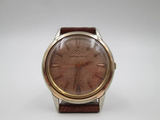 Eterna Matic. Acero y chapado oro. Automático. Esfera champagne. 1960