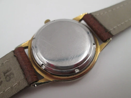 Eterna Matic. Acero y chapado oro. Automático. Esfera champagne. 1960