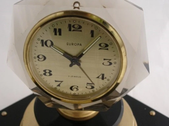 Europa musical alarm table clock. Gold plated metal and black resin. Germany. 1960's Europa musical alarm table clock. Gold plated metal and black resin. Germany. 1960's