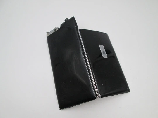 Evans art deco petrol lighter with cigarette case. Silver plated and black enamel. 1940's Evans art deco petrol lighter with cigarette case. Silver plated and black enamel. 1940's