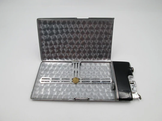 Evans art deco petrol lighter with cigarette case. Silver plated and black enamel. 1940's Evans art deco petrol lighter with cigarette case. Silver plated and black enamel. 1940's