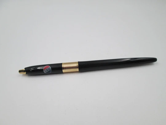 Eversharp ball point pen. Black plastic and gold plated. Push button system. 1950's. USA