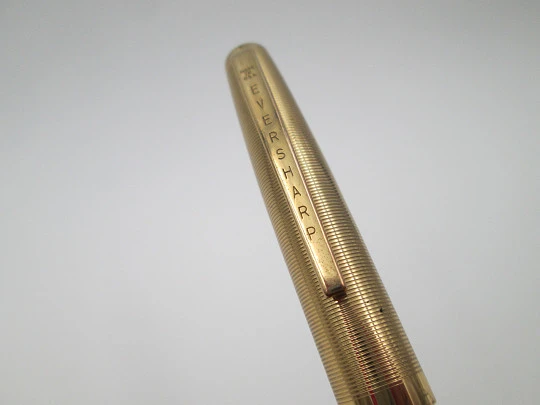 Eversharp. Green plastic body and gold plated cap. Push mechanism. 1950's. USA