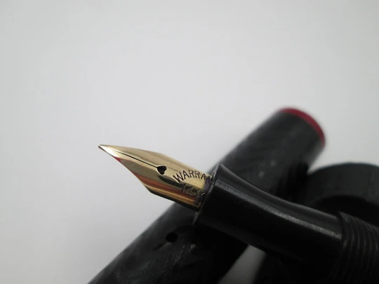 Eversmooth. Black hard rubber and red ends. 14 karat gold nib. Lever filler system. 1920's